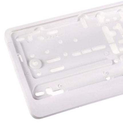 Рамка номера пластик белая (РНШ-14050) фото